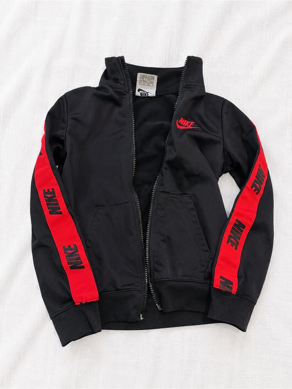 Nike Black Jacket with Red Sleeve Stripes - Kids